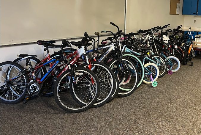 A row of bikes donated to the Arapahoe Santa Claus Shop